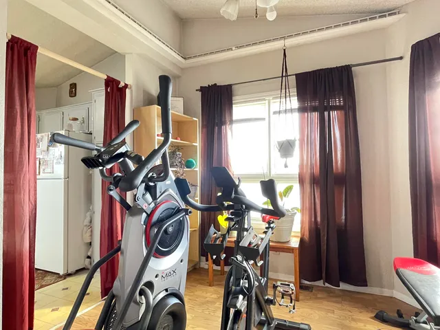 a view of a room with gym equipment