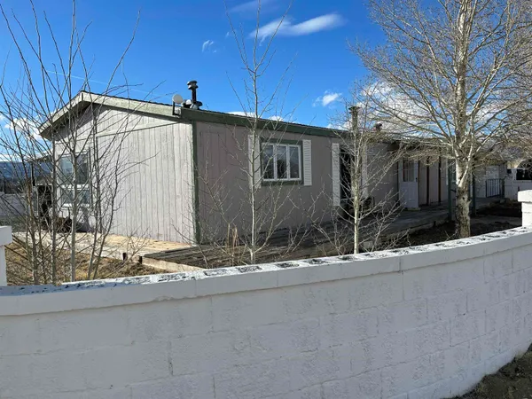 a view of a house with a patio