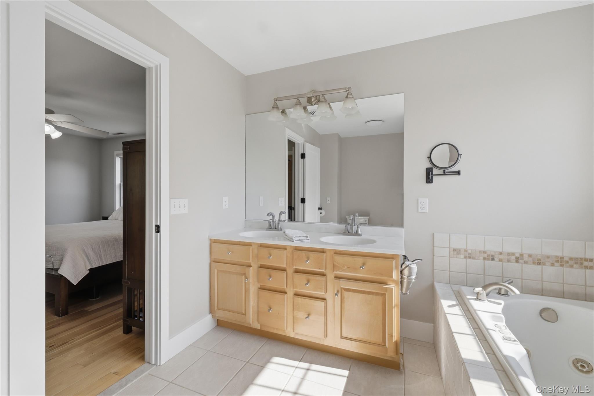 233 Devon Farms Road Stormville, NY 12582 - Photo 29 of 48 a spacious bathroom with a tub sink and mirror