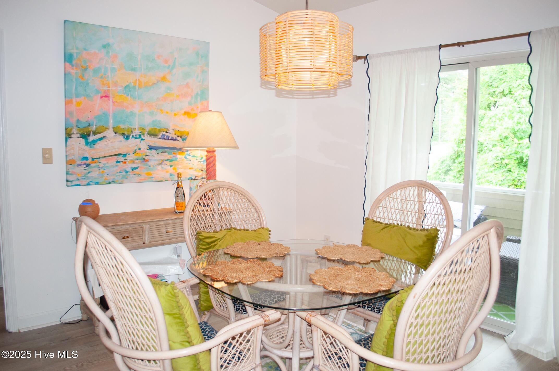 413 Commerce Avenue, Unit D Morehead City, NC 28557 - Photo 11 of 22 Dining area opens to covered porch