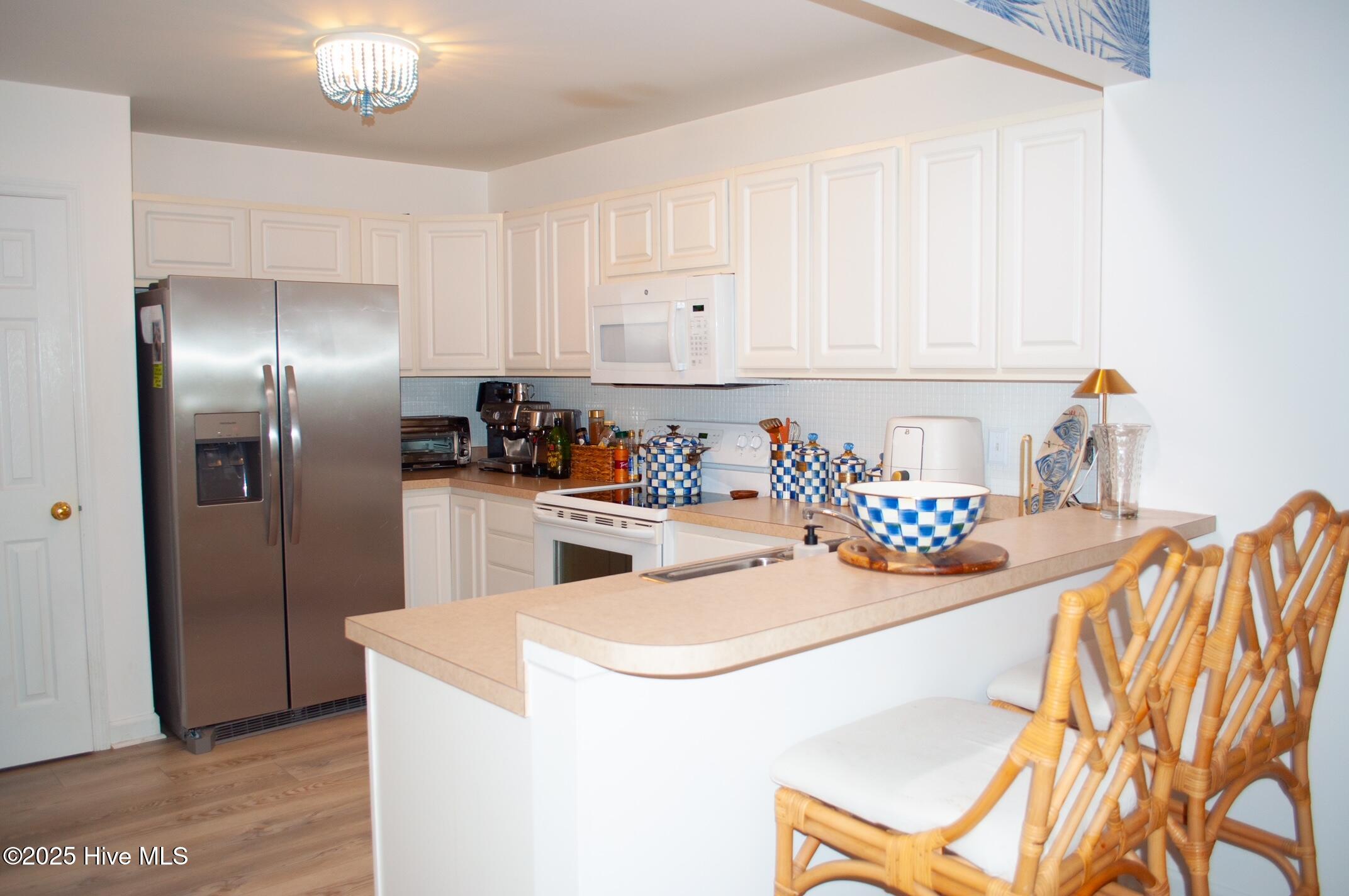 413 Commerce Avenue, Unit D Morehead City, NC 28557 - Photo 14 of 22 Kitchen with pantry