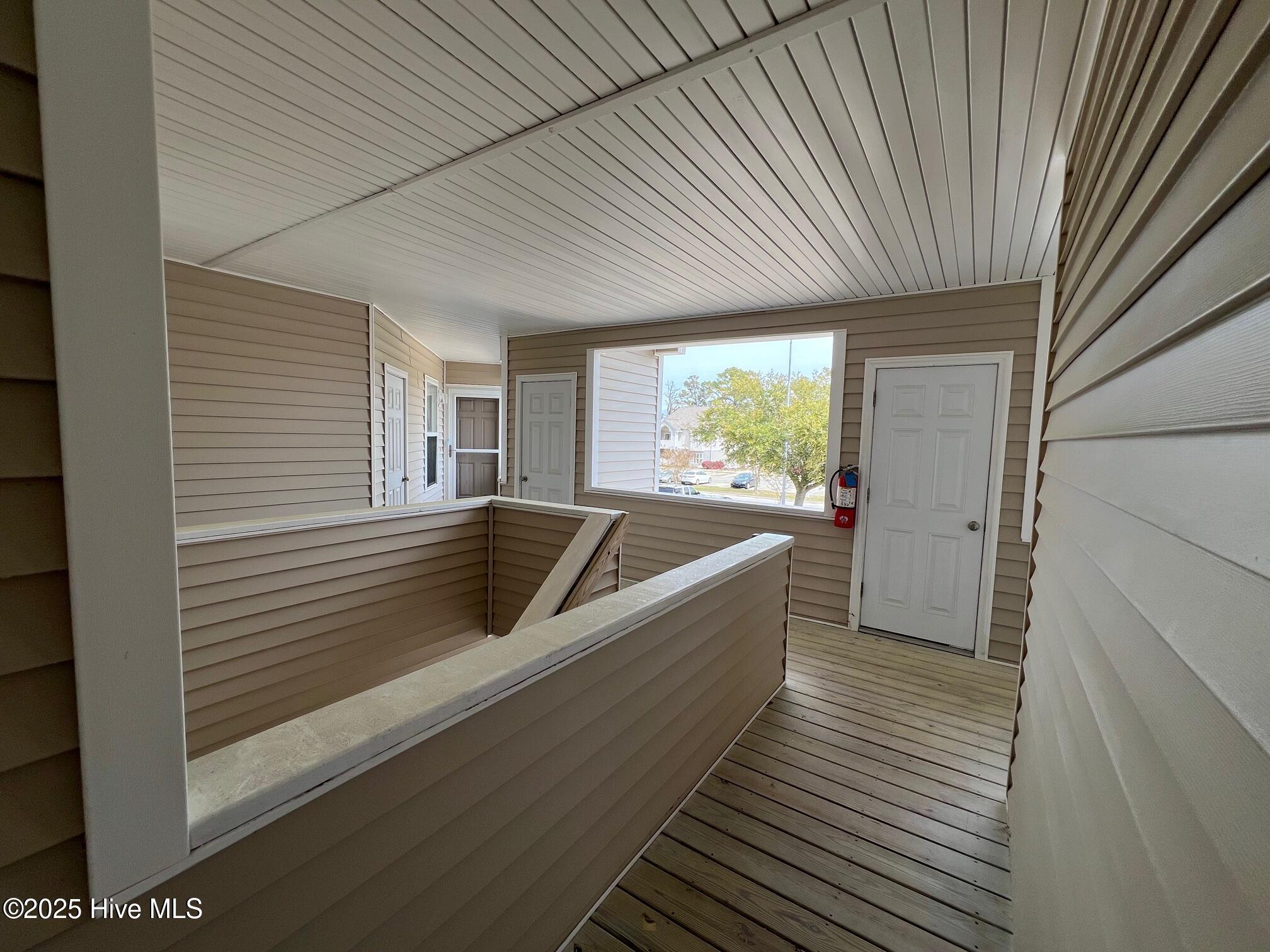 413 Commerce Avenue, Unit D Morehead City, NC 28557 - Photo 6 of 22 2nd floor landing top of stairs