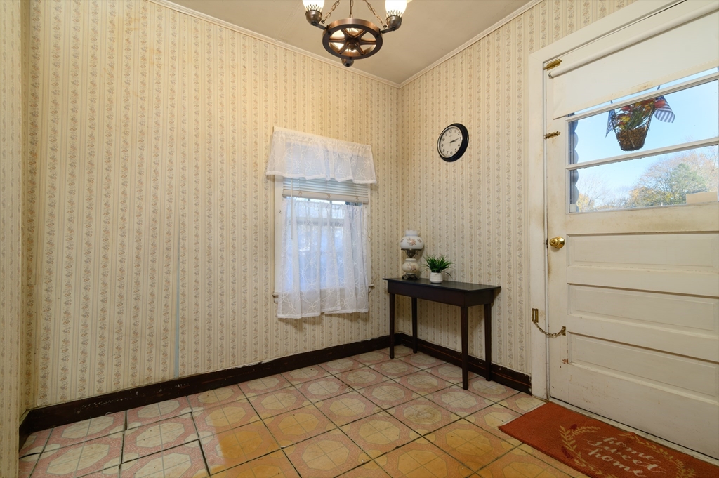 30 Puritan Road Weymouth, MA 02189 - Photo 13 of 34 a view of an entryway with wooden floor