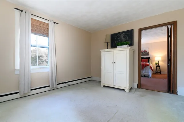 an empty room with mirror