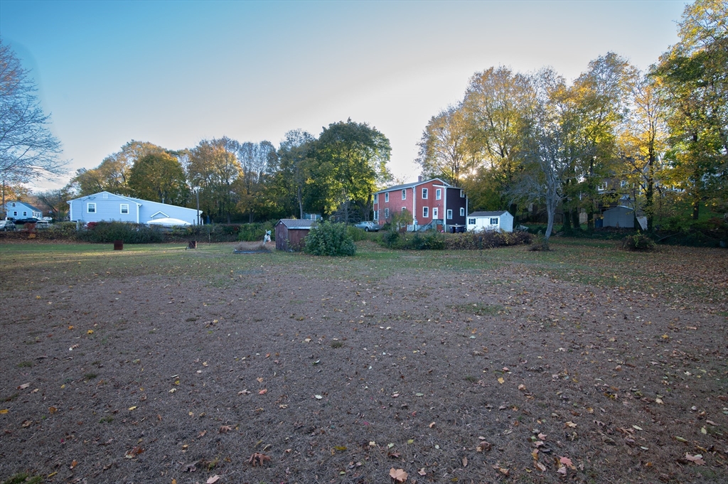 30 Puritan Road Weymouth, MA 02189 - Photo 26 of 34 a fire hydrant in the middle of a field