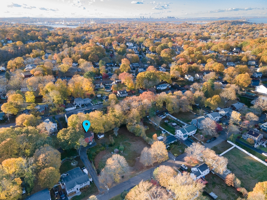 30 Puritan Road Weymouth, MA 02189 - Photo 29 of 34 an aerial view of a houses with a swimming pool