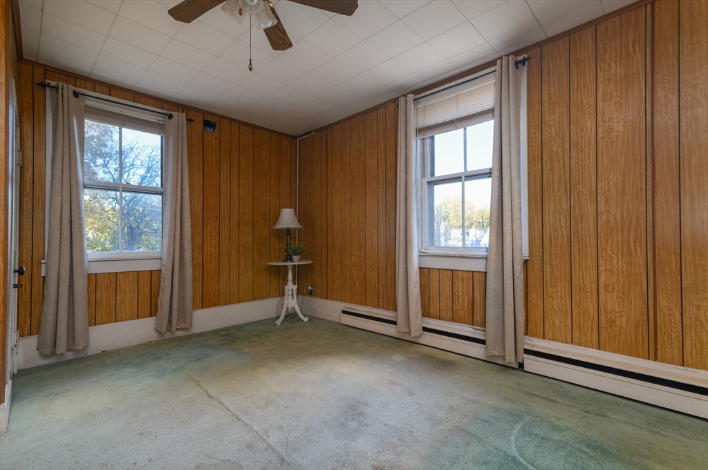30 Puritan Road Weymouth, MA 02189 - Photo 9 of 34 a view of an empty room with a window
