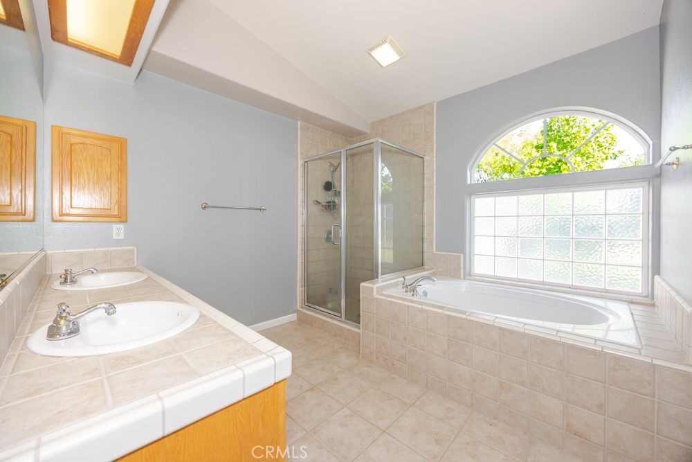 7084 Aster Road Oak Hills, CA 92344 - Photo 15 of 34 Primary Bath