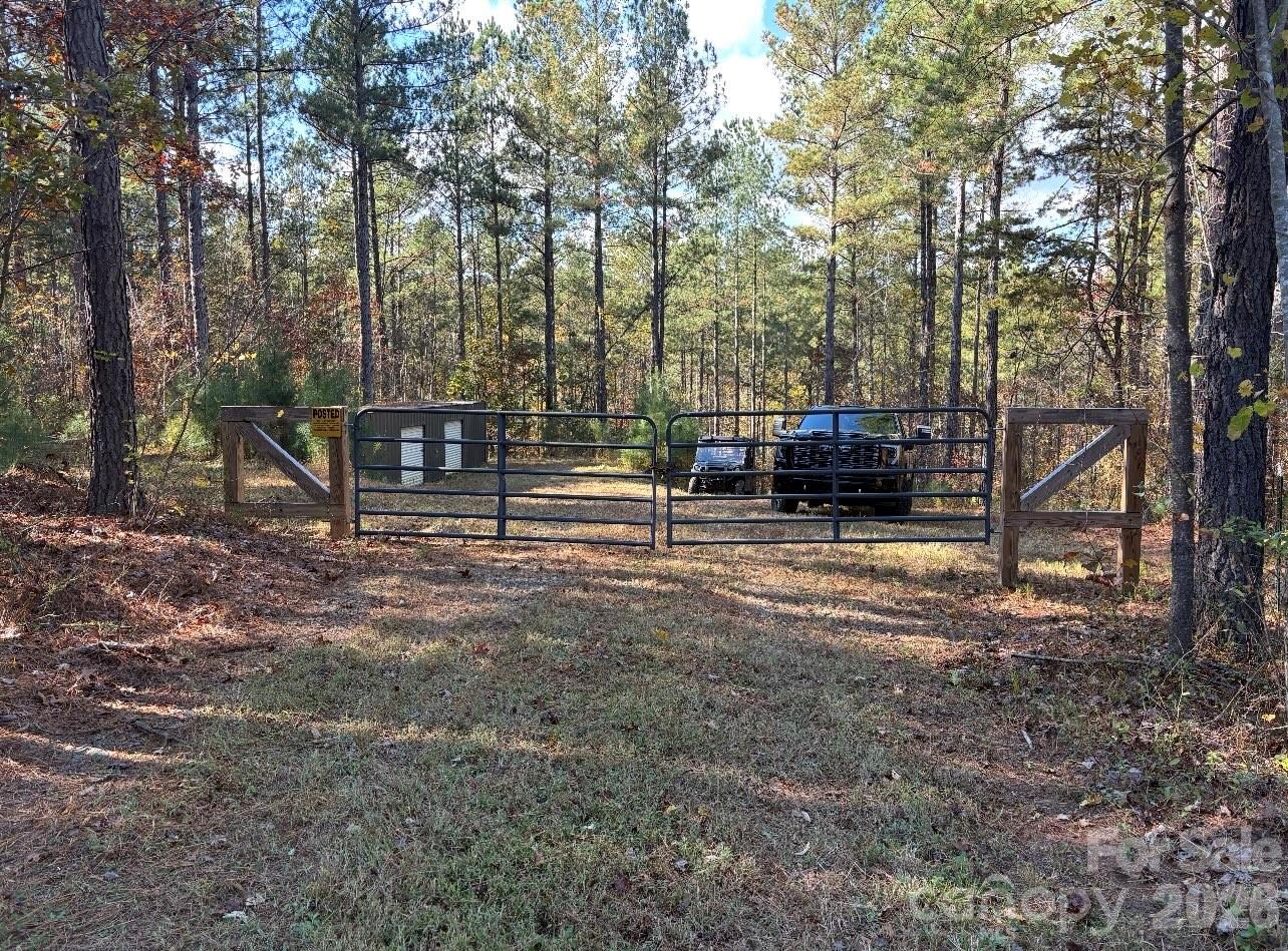1486 Huffman Bridge Road Morganton, NC 28655 - Photo 16 of 19 a view of outdoor space with deck and trees