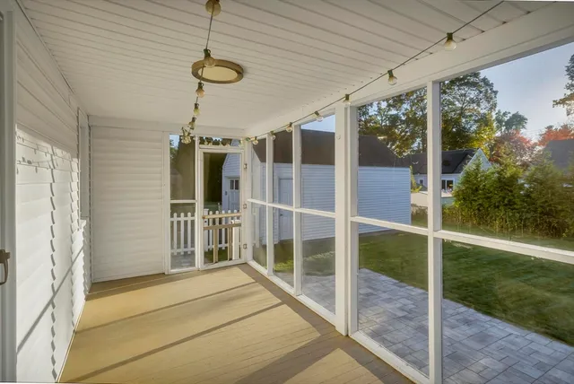a balcony view with a flat screen tv