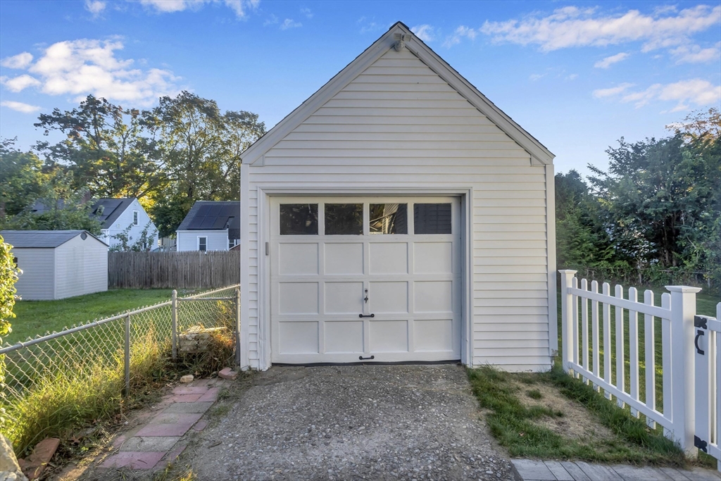 154 Ellsworth Avenue Springfield, MA 01118 - Photo 21 of 22 a front view of a house with a yard
