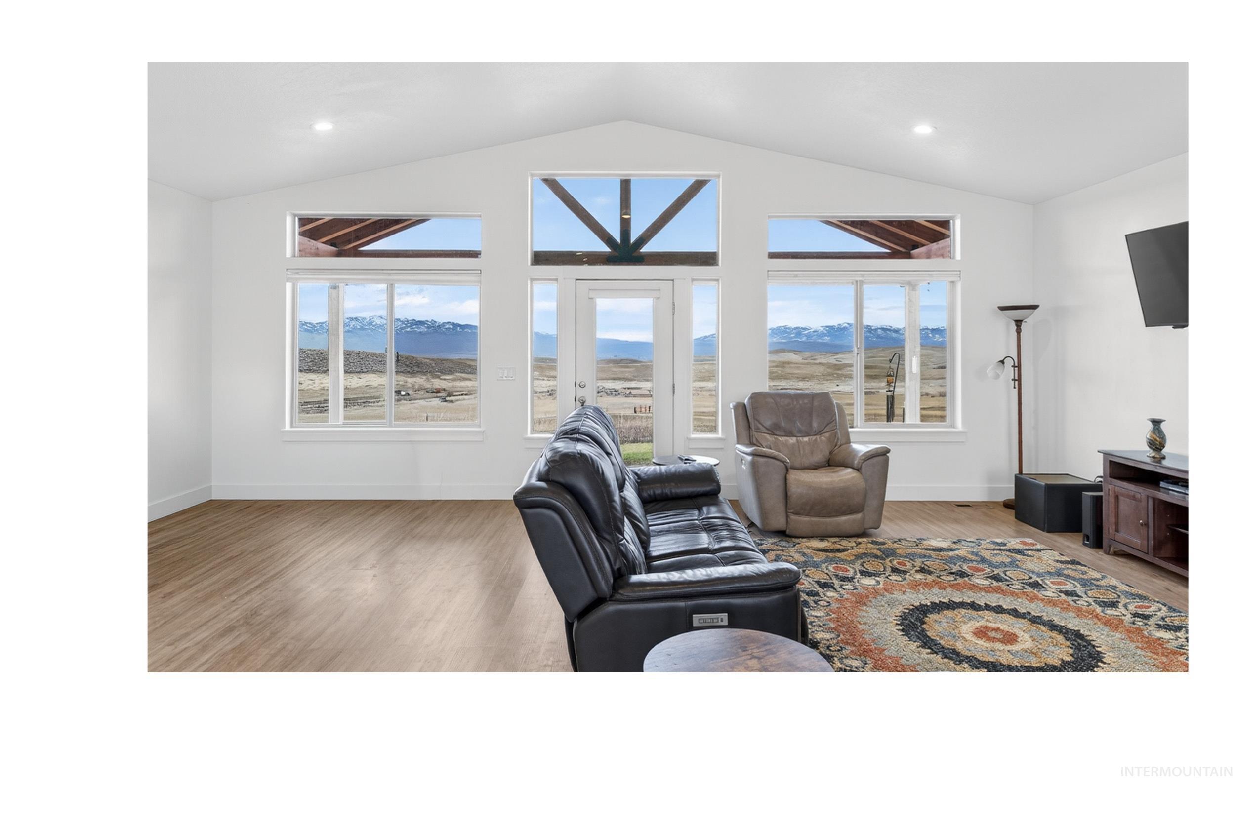 1854 Jacks Road Midvale, ID 83645 - Photo 2 of 16 Living area with light wood-type flooring, healthy amount of natural light, and recessed lighting