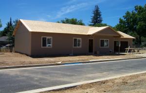 5490 Cedars Road Redding, CA 96001 - Photo 1 of 1 a front view of a house with a yard