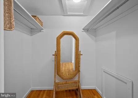 a view of entryway with a door and wooden floor