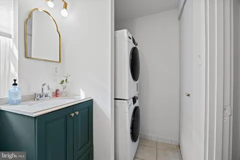 a bathroom with a sink and mirror