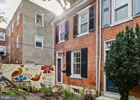 a front view of a building with glass windows