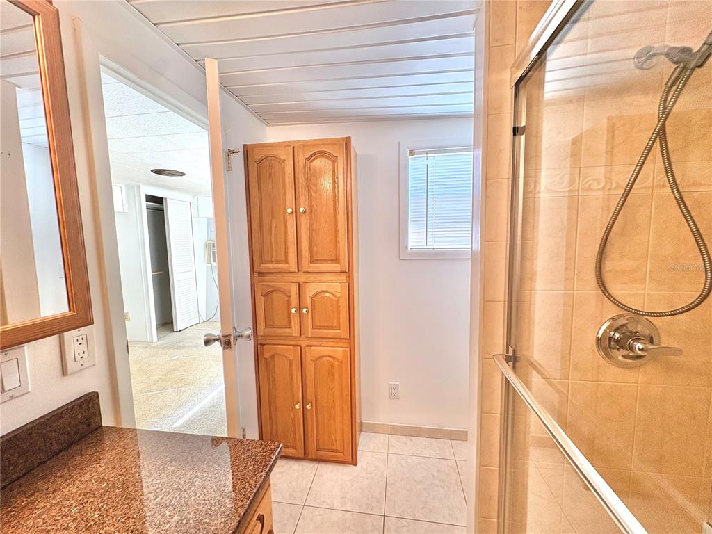 440 Denice Drive Seminole, FL 33772 - Photo 24 of 40 a view of a bathroom with a shower