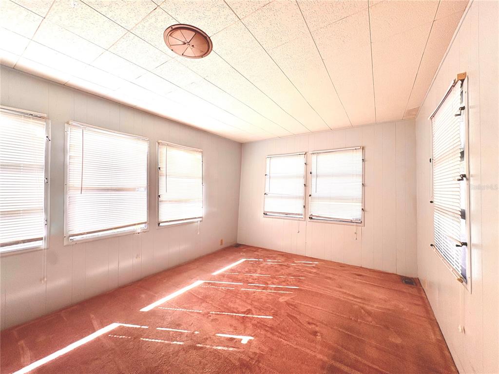 440 Denice Drive Seminole, FL 33772 - Photo 26 of 40 a view of an empty room with a window