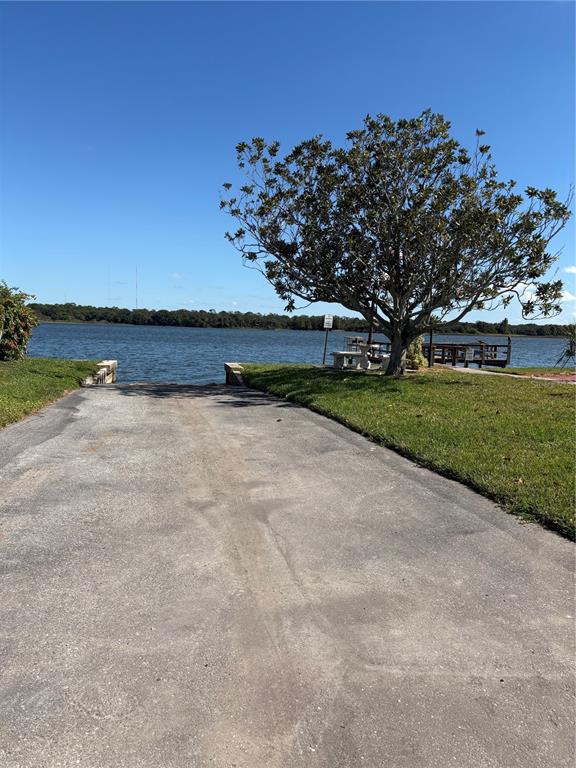 440 Denice Drive Seminole, FL 33772 - Photo 37 of 40 a view of lake with outdoor space