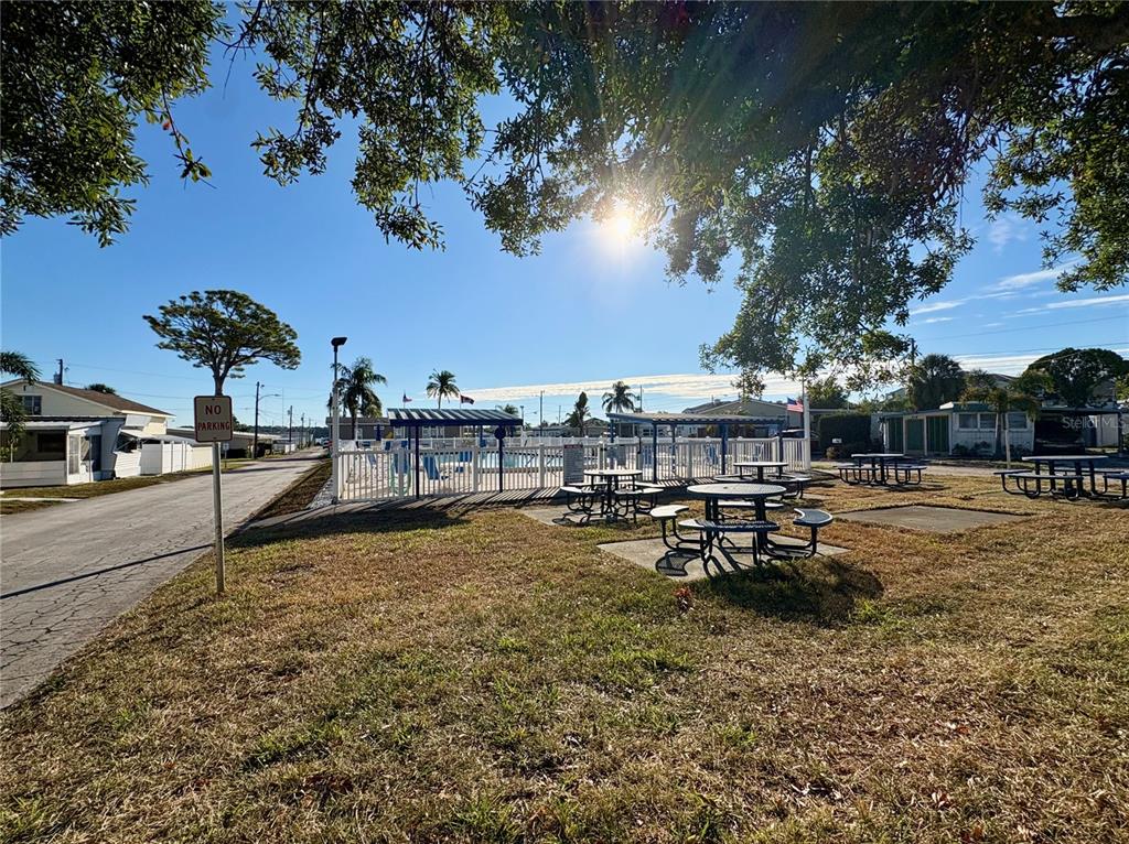 440 Denice Drive Seminole, FL 33772 - Photo 39 of 40 a view of a lake with sitting area