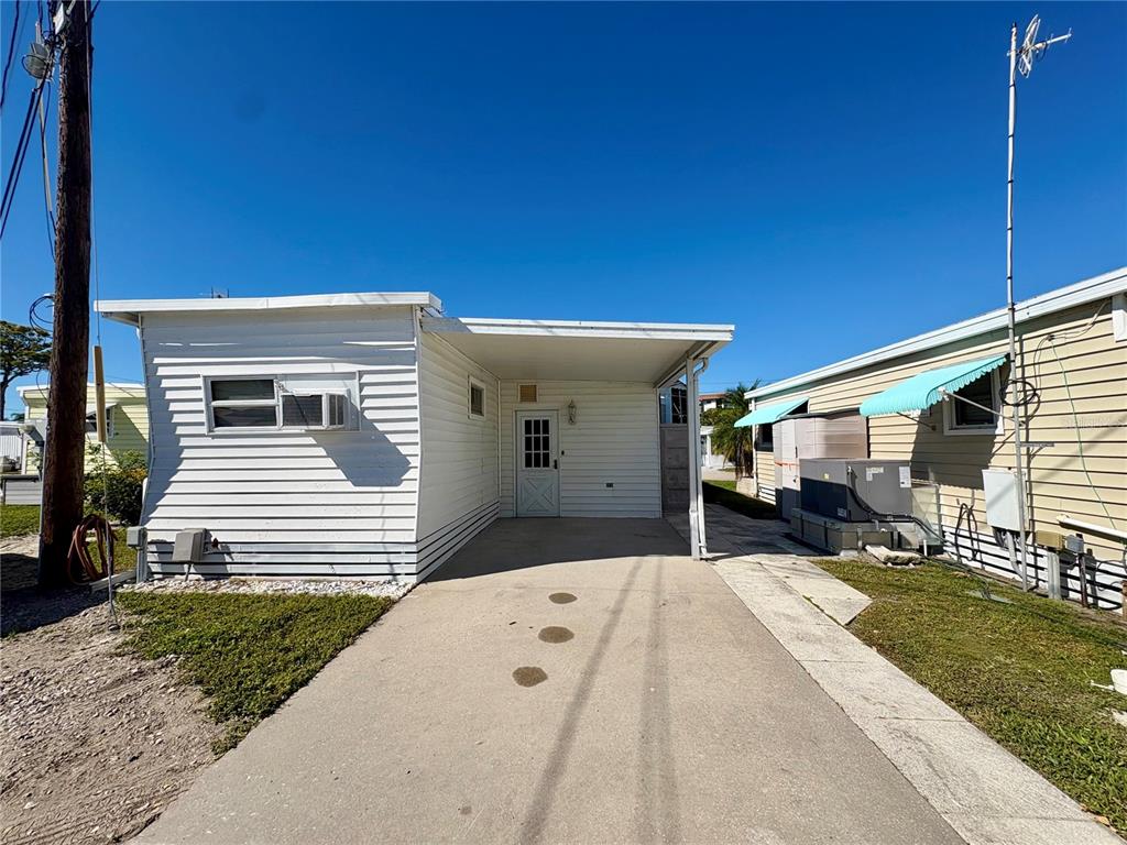 440 Denice Drive Seminole, FL 33772 - Photo 10 of 40 a front view of a house with a yard