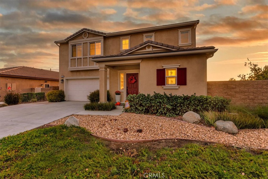 7075 Laban Lane Riverside, CA 92507 - Photo 1 of 1 a front view of a house with a yard