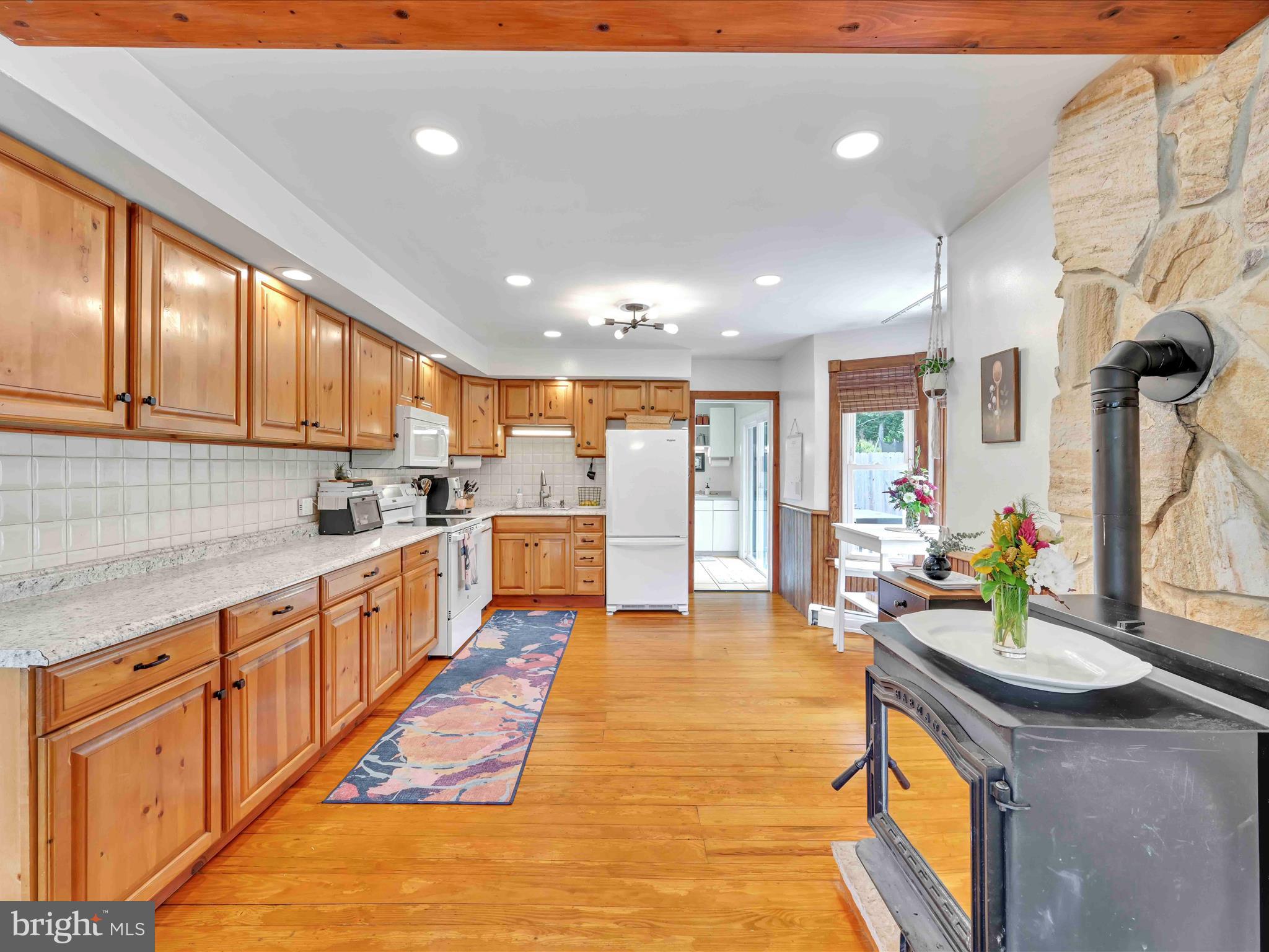 1036 Baker Road Reading, PA 19608 - Photo 12 of 44 a large kitchen with stainless steel appliances granite countertop a large counter top a stove a sink and a refrigerator