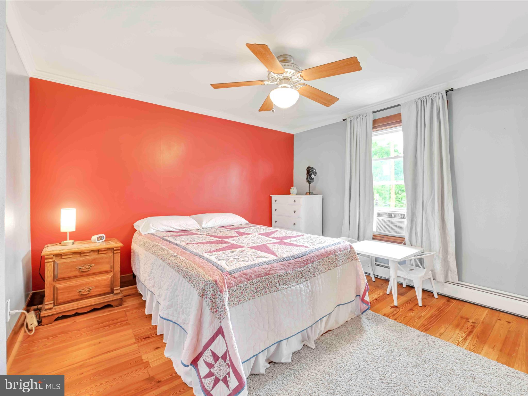 1036 Baker Road Reading, PA 19608 - Photo 24 of 44 a bedroom with a bed and a chandelier
