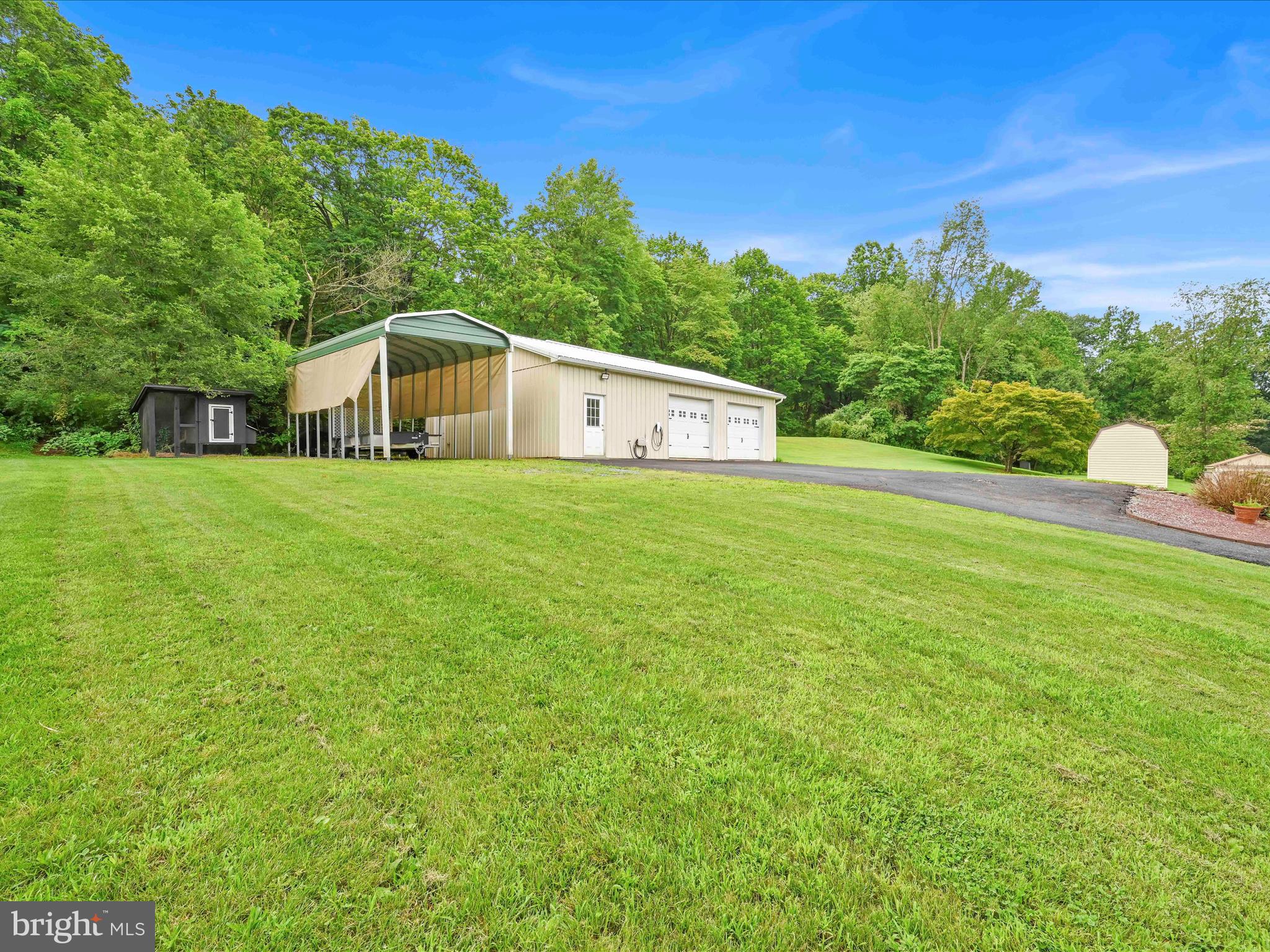 1036 Baker Road Reading, PA 19608 - Photo 35 of 44 a front view of a house with a yard