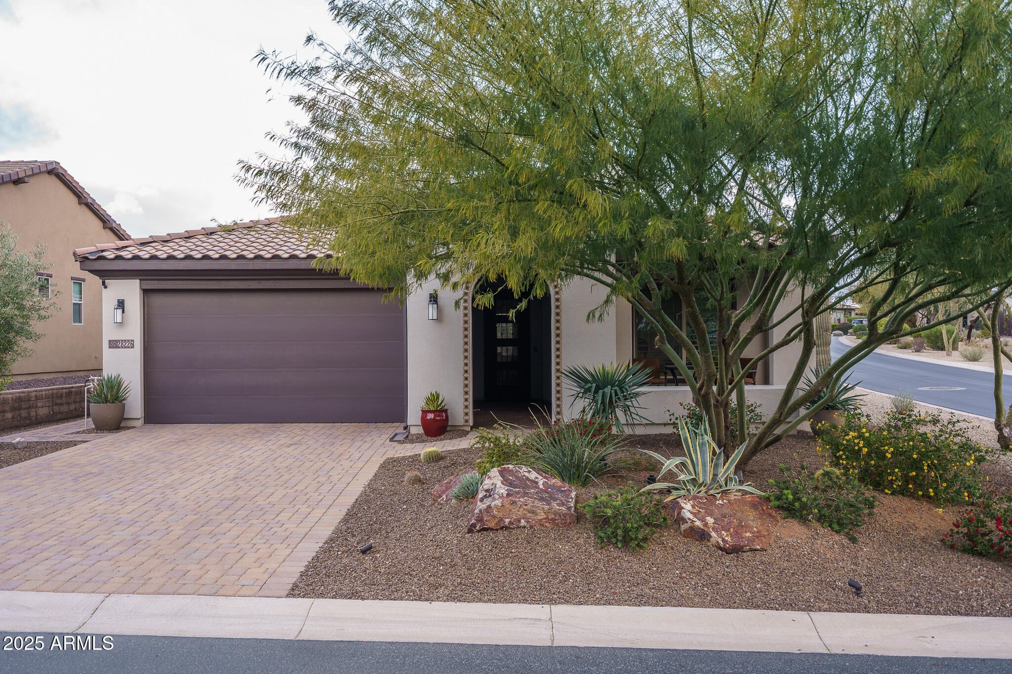 28226 North Crook Court Rio Verde, AZ 85263 - Photo 3 of 28 a front view of a house with garden