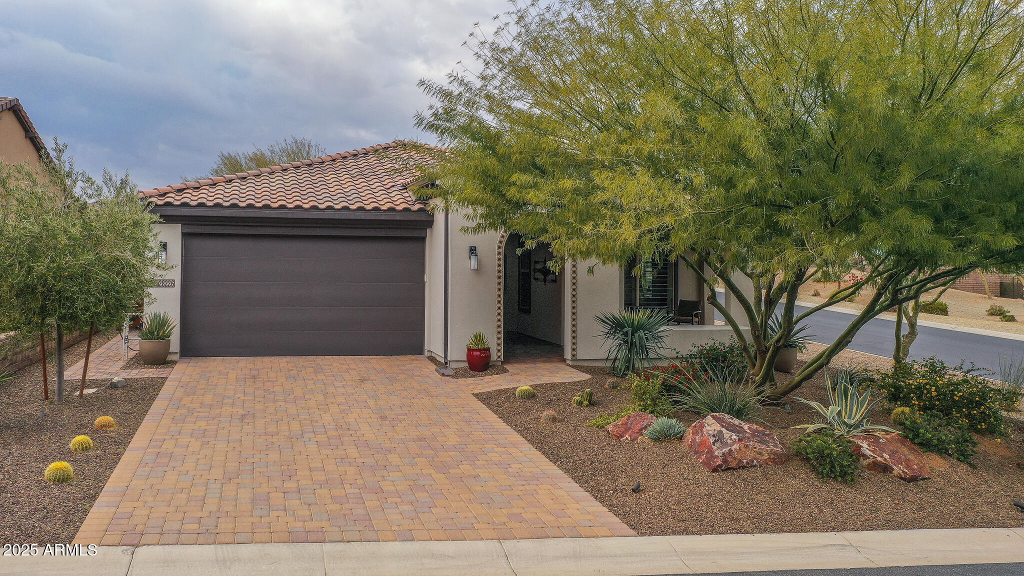 28226 North Crook Court Rio Verde, AZ 85263 - Photo 4 of 28 a front view of a house with garden