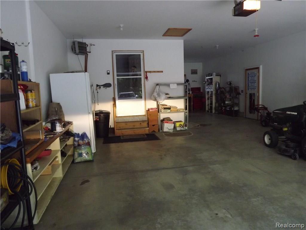 2825 Burden Road Stockbridge, MI 49285 - Photo 10 of 62 3 car attached garage