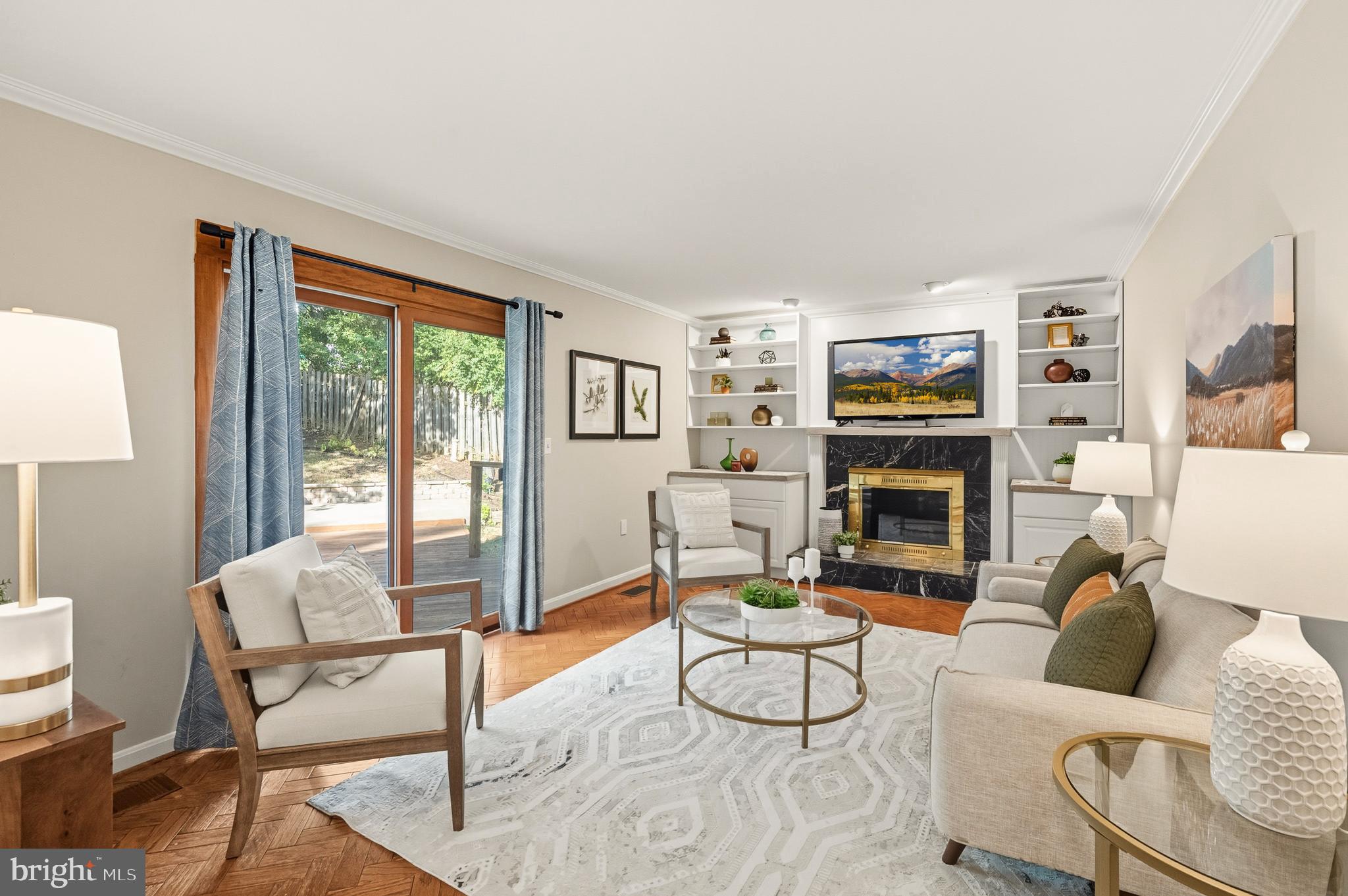 2352 Cedar Lane Vienna, VA 22182 - Photo 14 of 59 a living room with furniture a large window and a fireplace