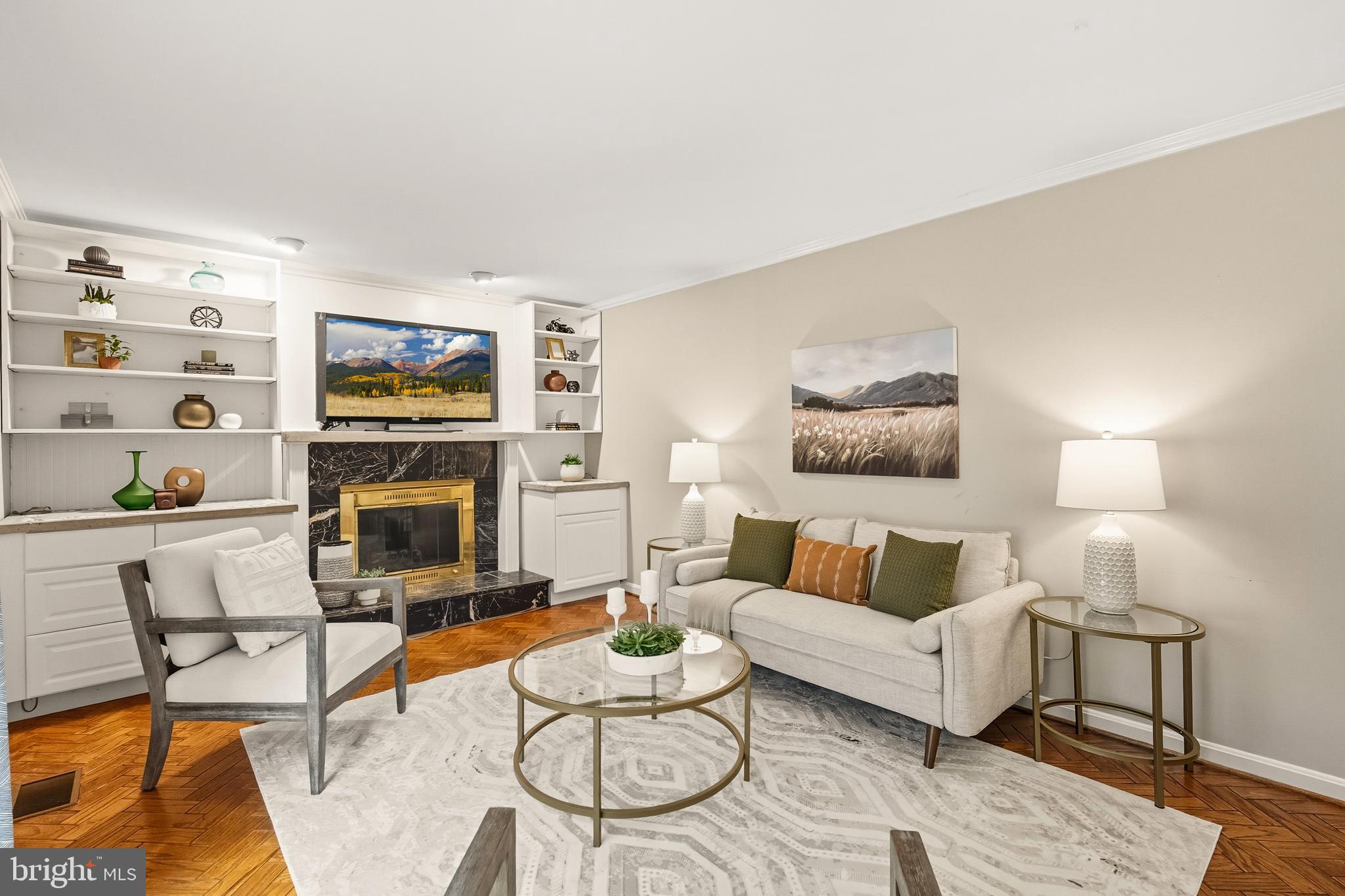 2352 Cedar Lane Vienna, VA 22182 - Photo 15 of 59 a living room with furniture a flat screen tv and a fireplace