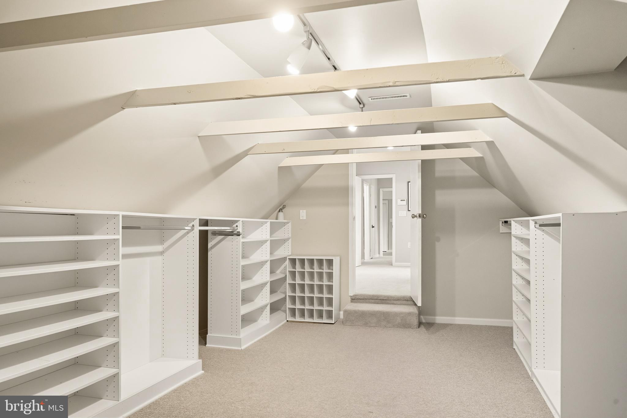 2352 Cedar Lane Vienna, VA 22182 - Photo 26 of 59 a view of walk in closet with empty racks