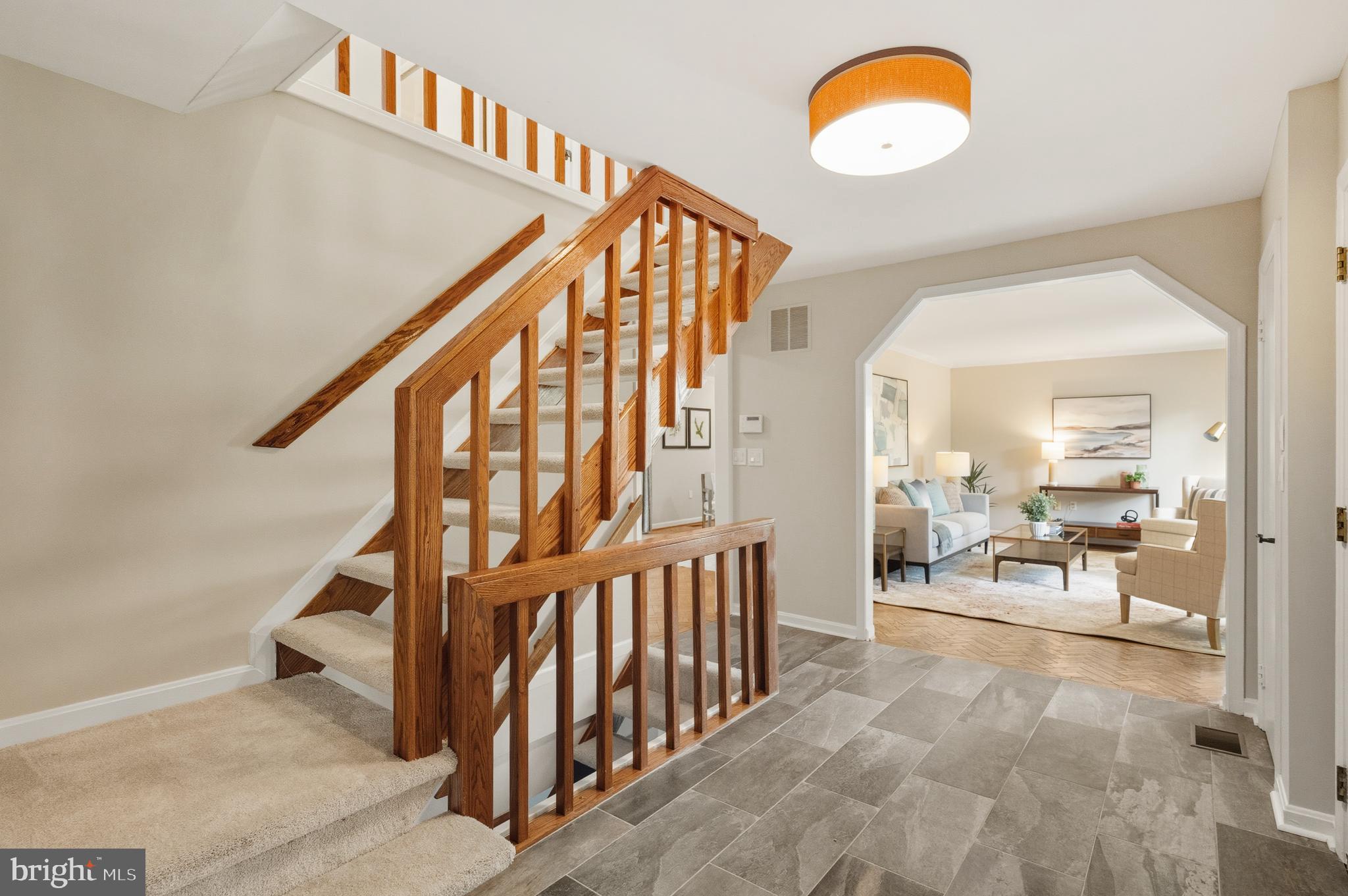2352 Cedar Lane Vienna, VA 22182 - Photo 3 of 59 a view of entryway livingroom and hall with wooden floor