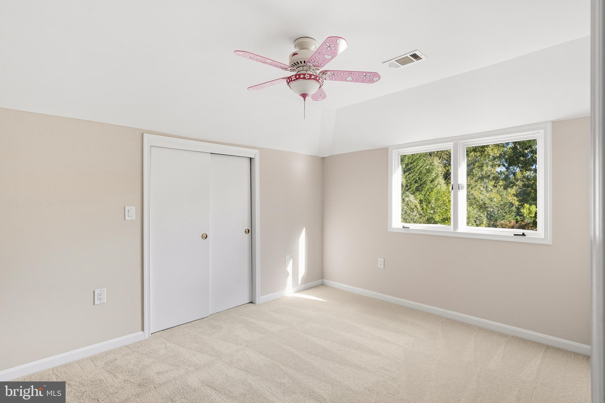 2352 Cedar Lane Vienna, VA 22182 - Photo 33 of 59 a view of a livingroom with a ceiling fan and window