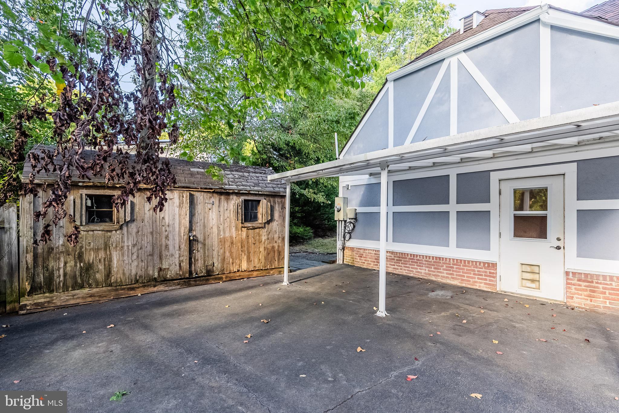2352 Cedar Lane Vienna, VA 22182 - Photo 54 of 59 a view of a house with a yard and large tree