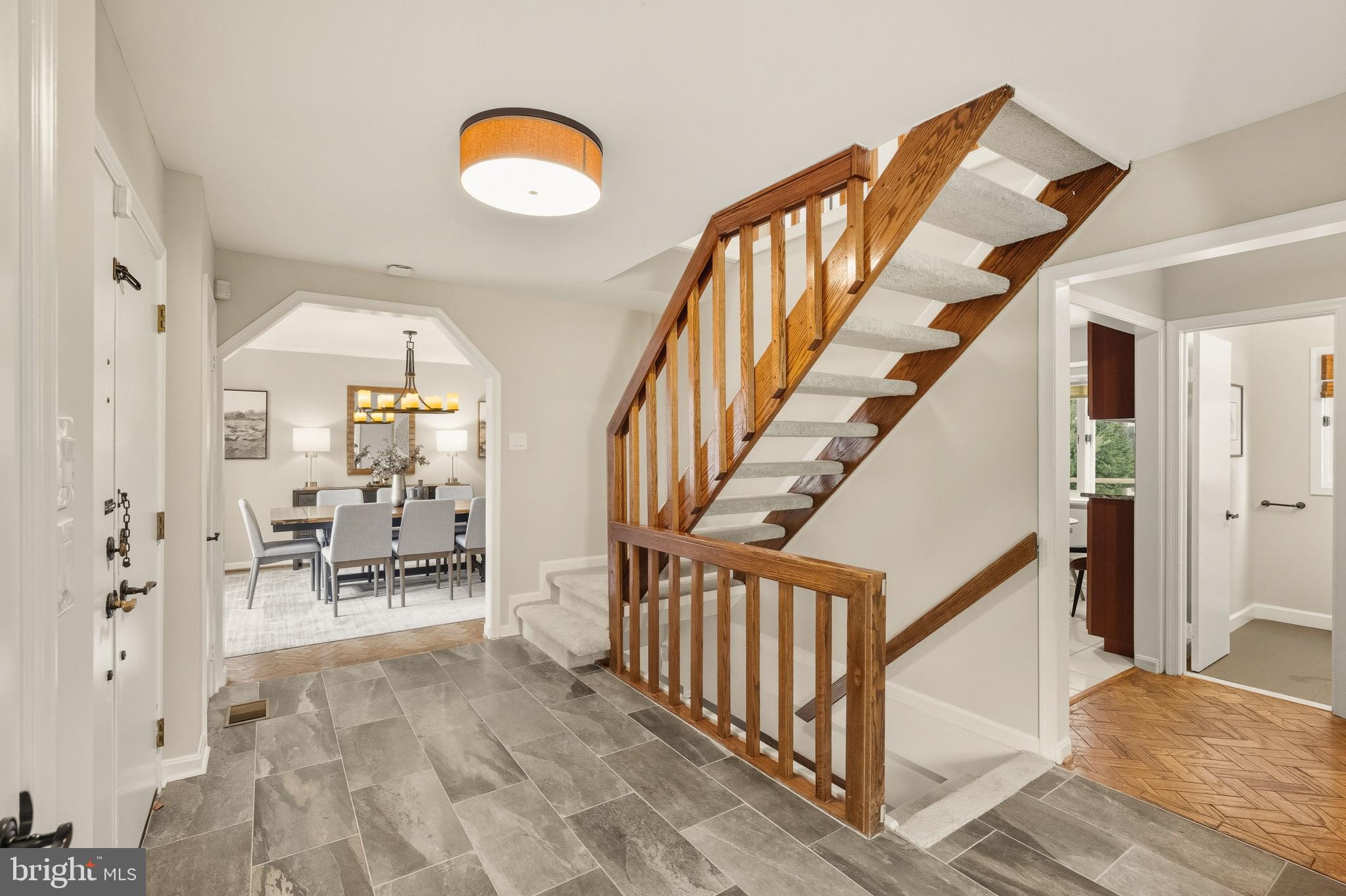 2352 Cedar Lane Vienna, VA 22182 - Photo 6 of 59 a view of entryway and hall with wooden floor