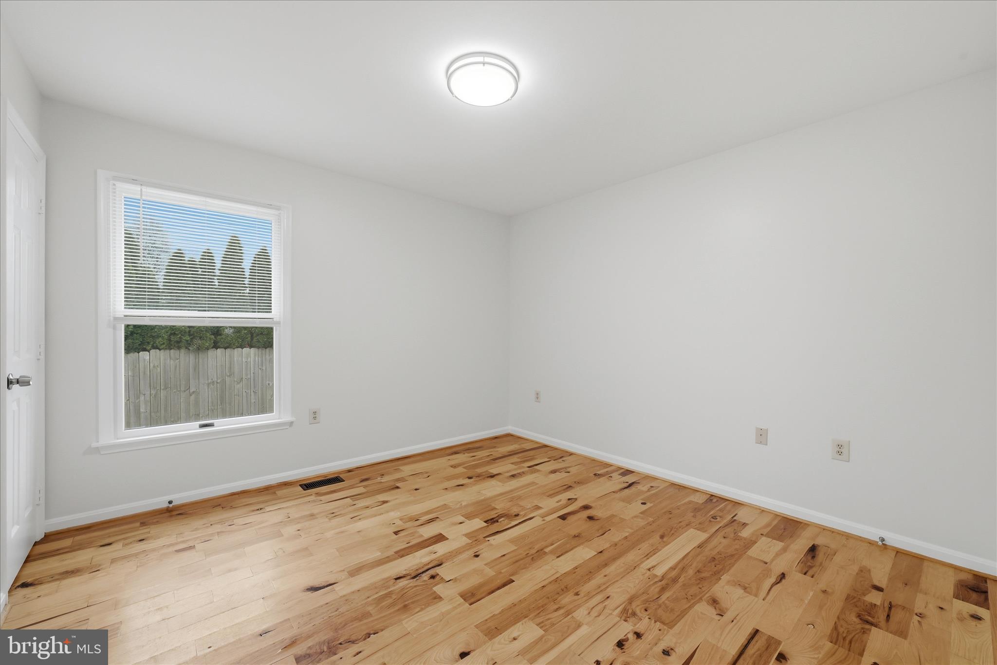 502 East 6th Avenue Ranson, WV 25438 - Photo 18 of 40 an empty room with a window