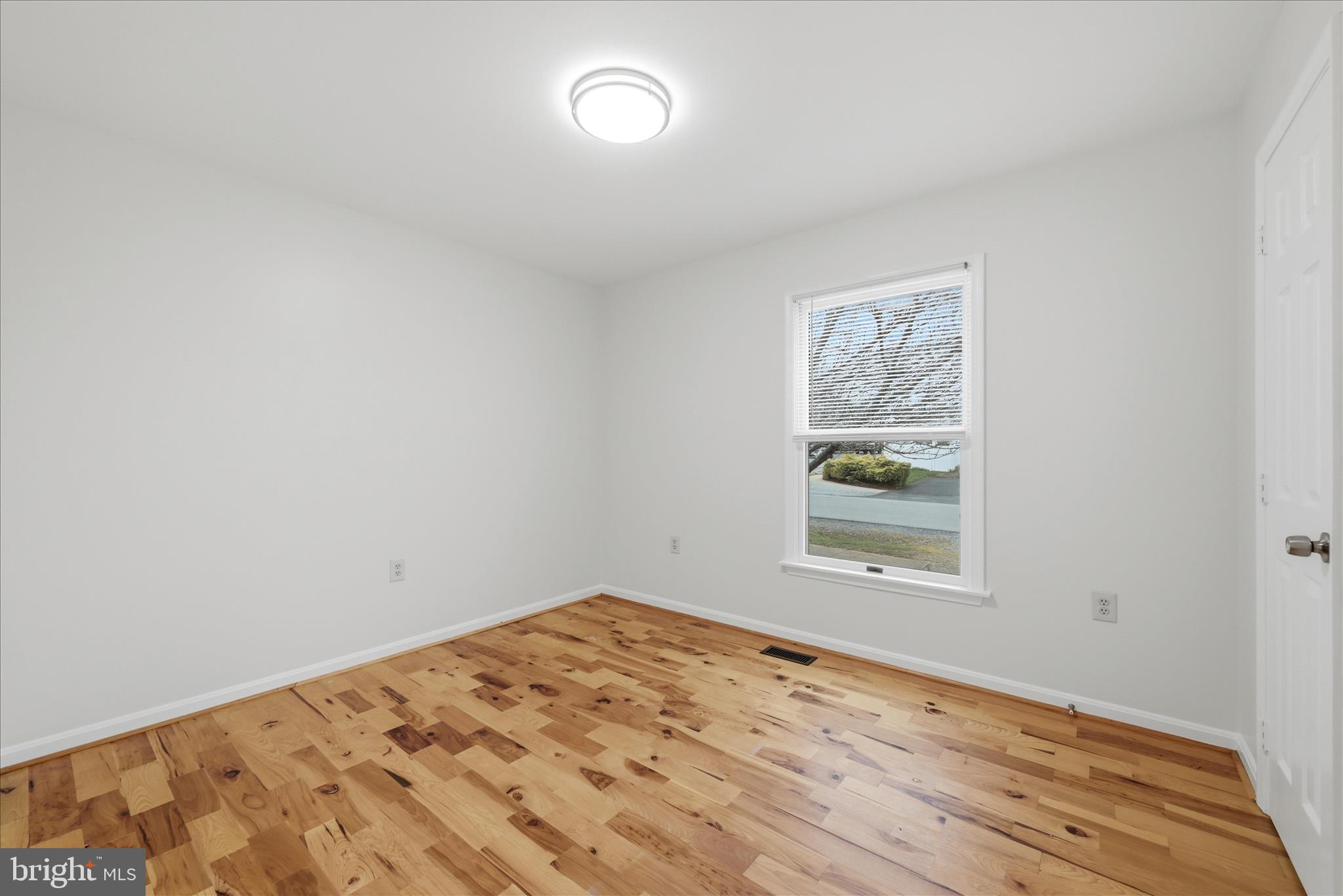 502 East 6th Avenue Ranson, WV 25438 - Photo 23 of 40 an empty room with a window