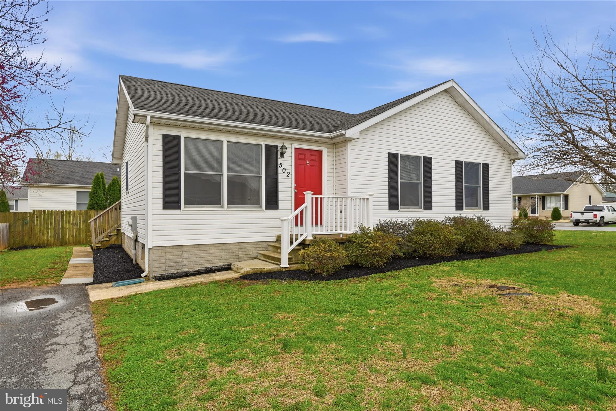 502 East 6th Avenue Ranson, WV 25438 - Photo 3 of 40 a view of a house with a yard and plants
