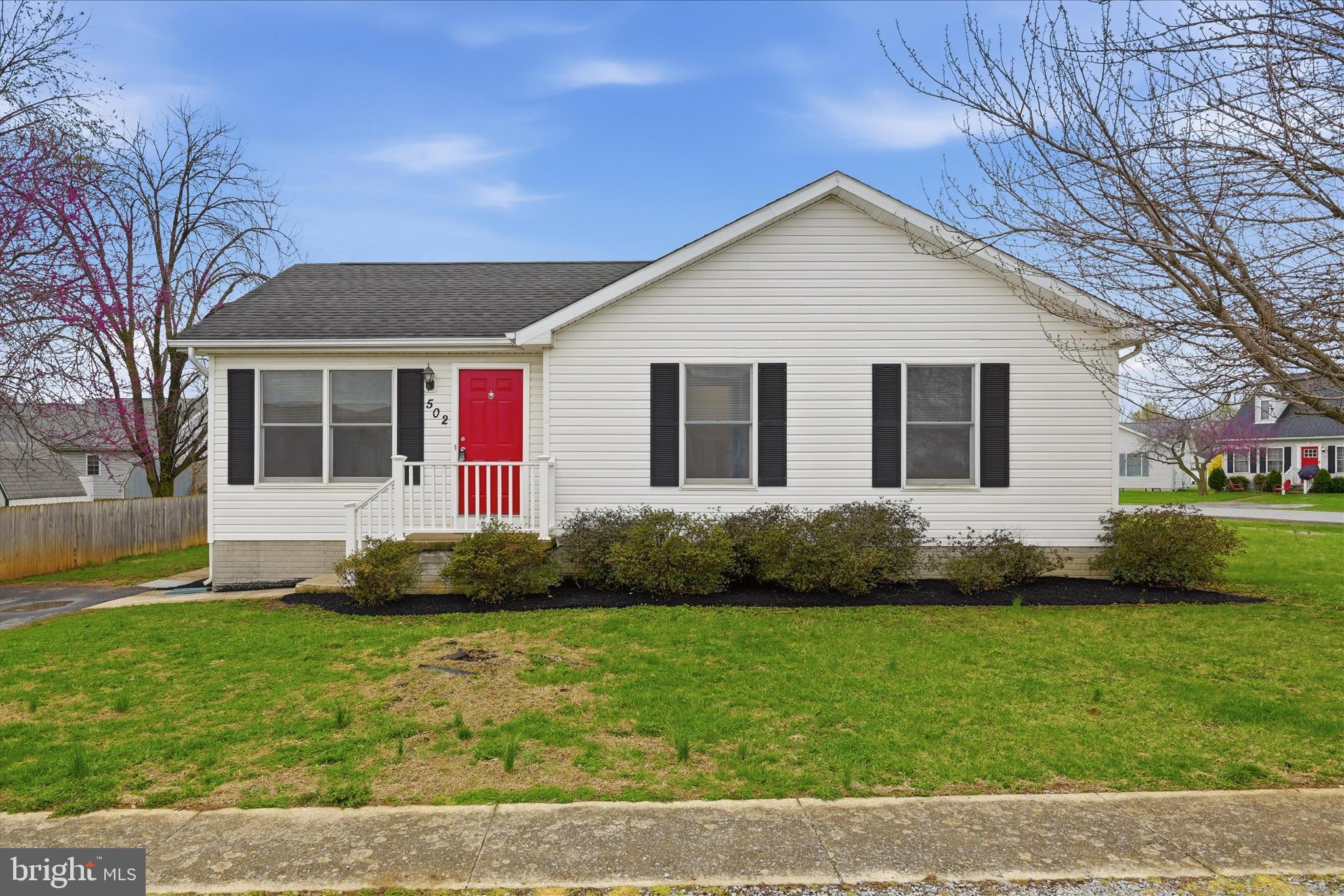 502 East 6th Avenue Ranson, WV 25438 - Photo 35 of 40 a front view of a house with a yard