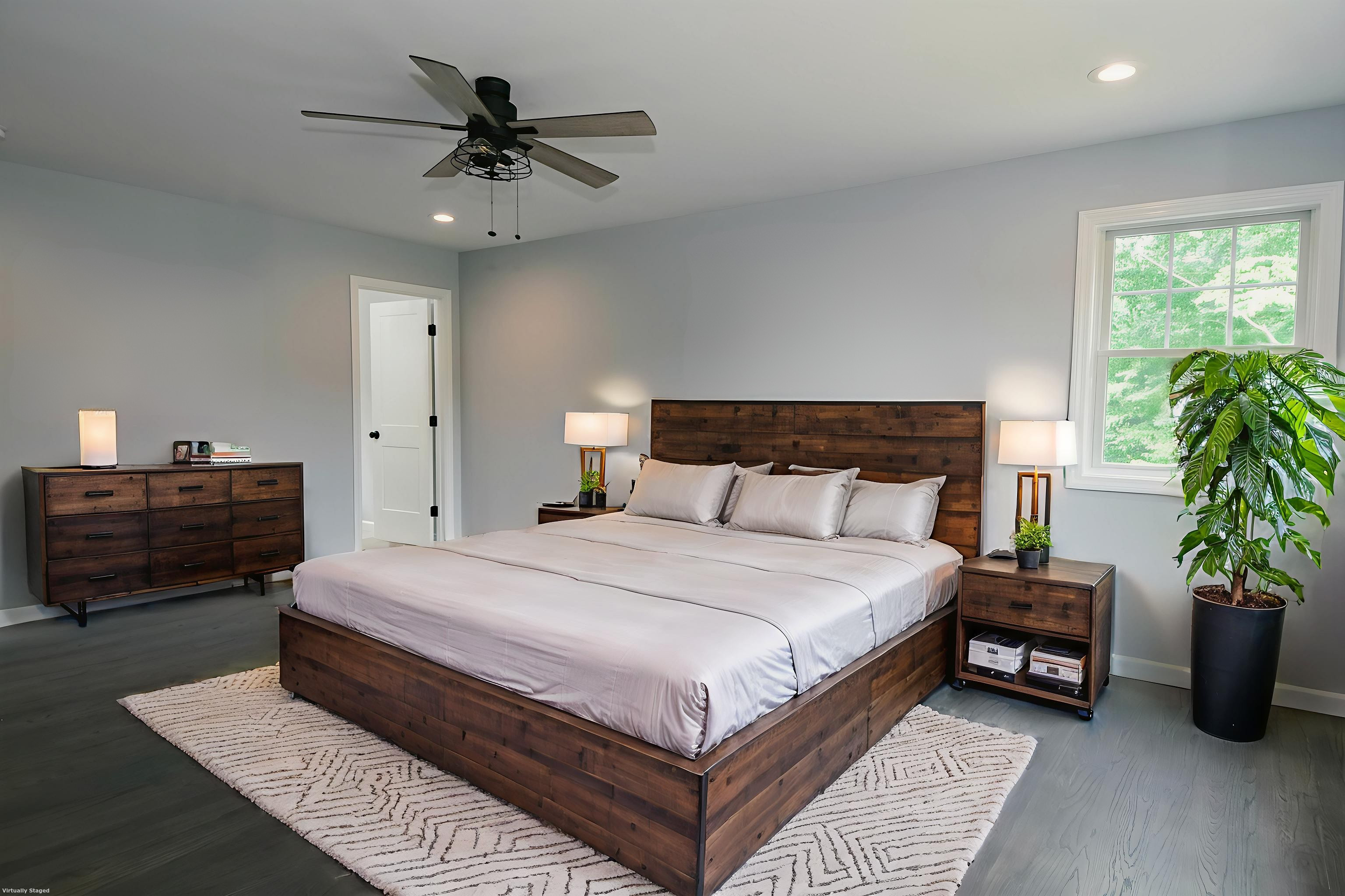 155 Old Common Road Wethersfield, CT 06109 - Photo 11 of 22 a bedroom with a bed and a potted plant