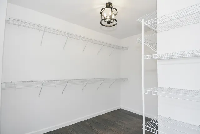 a view of small space with racks on the wall