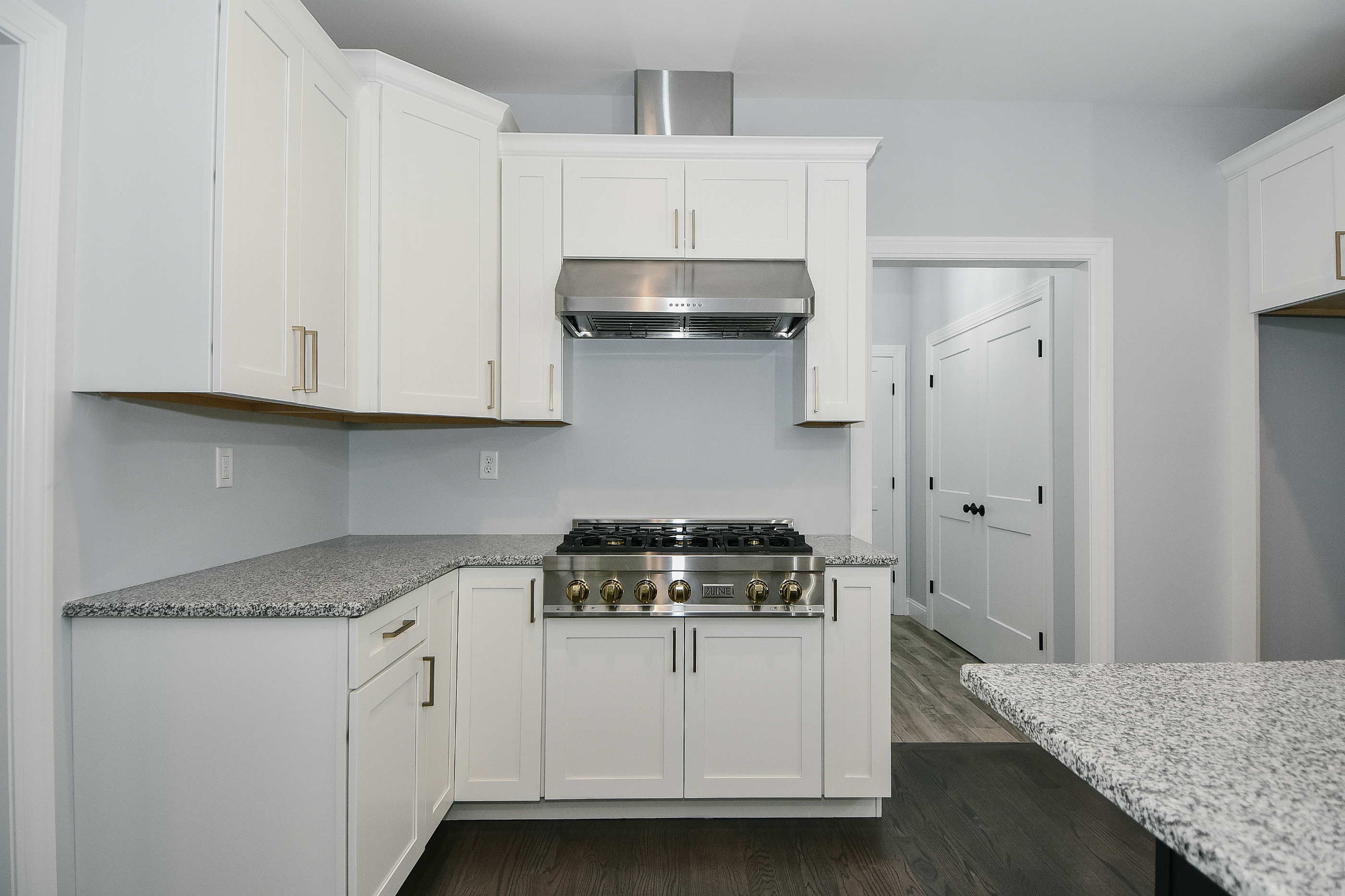 155 Old Common Road Wethersfield, CT 06109 - Photo 3 of 22 a kitchen with granite countertop white cabinets and white appliances