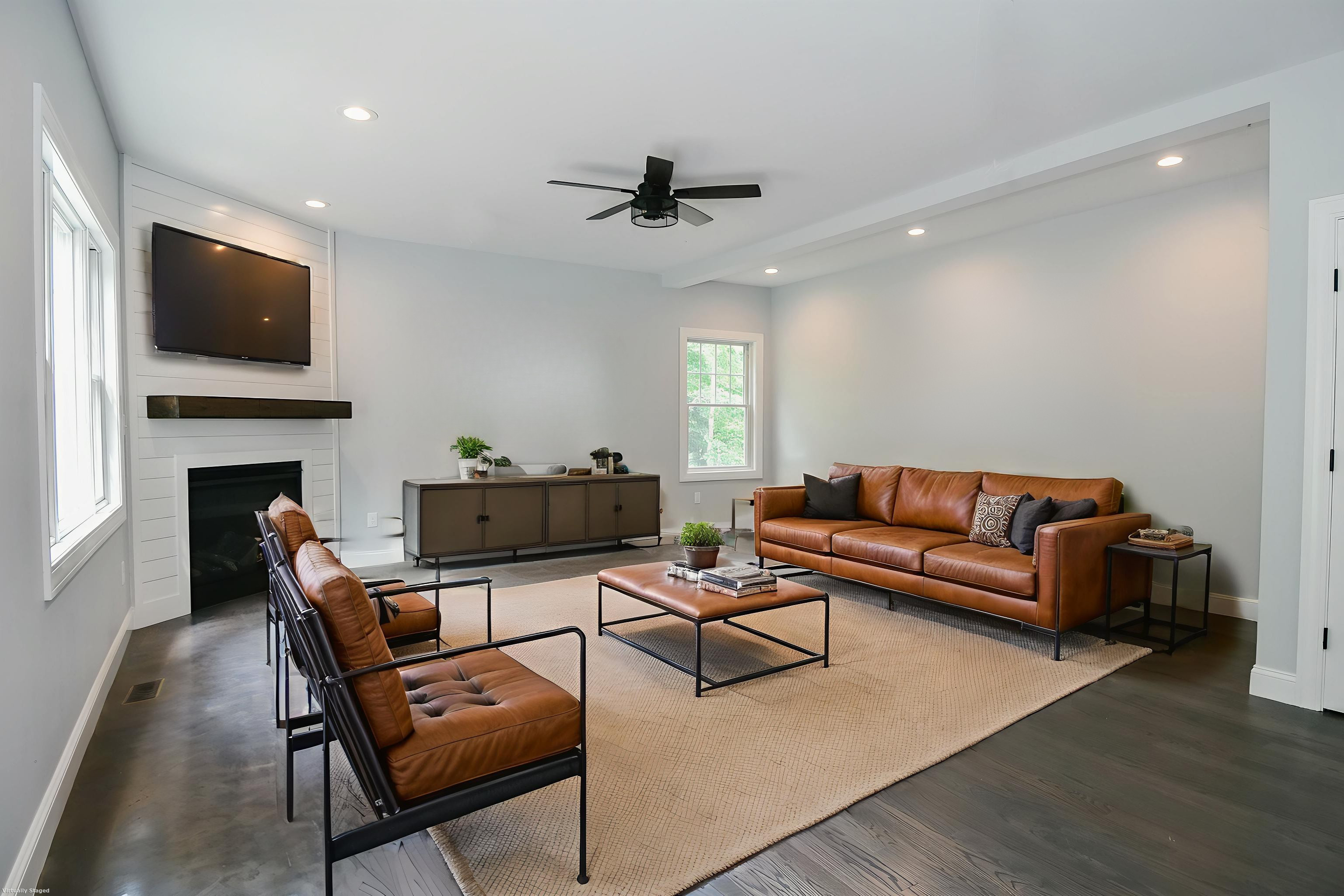 155 Old Common Road Wethersfield, CT 06109 - Photo 7 of 22 a living room with furniture a fireplace and a flat screen tv