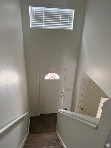 747 Hanover Drive Orem, UT 84058 - Photo 9 of 30 Stairs featuring a high ceiling and wood finished floors