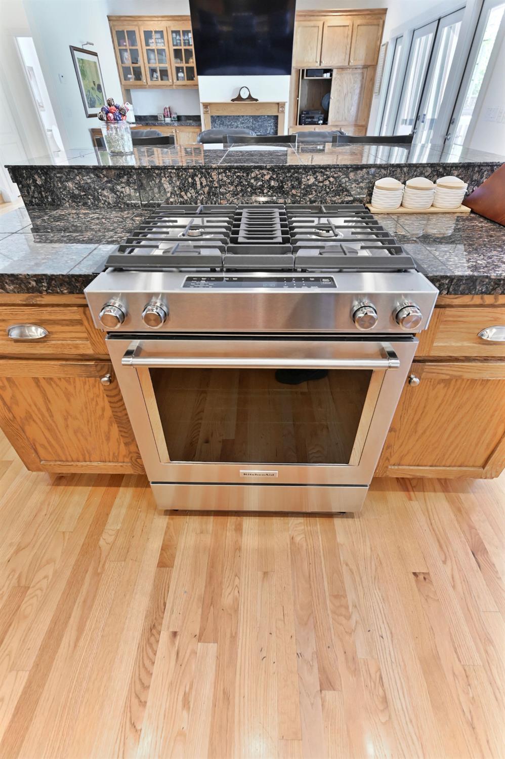 511 Surrey Lane Murphys, CA 95247 - Photo 20 of 97 a stove top oven sitting inside of a kitchen