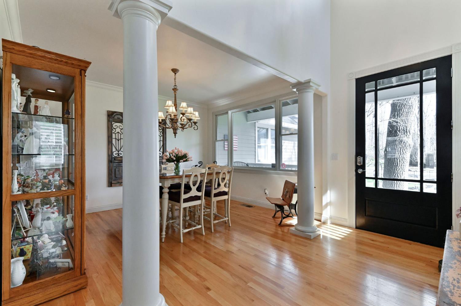 511 Surrey Lane Murphys, CA 95247 - Photo 23 of 97 a view of a dining room with furniture and a chandelier